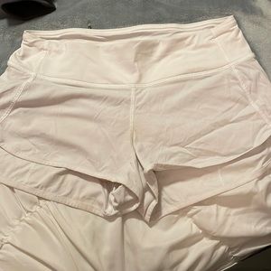 White Lululemon shorts, size 4